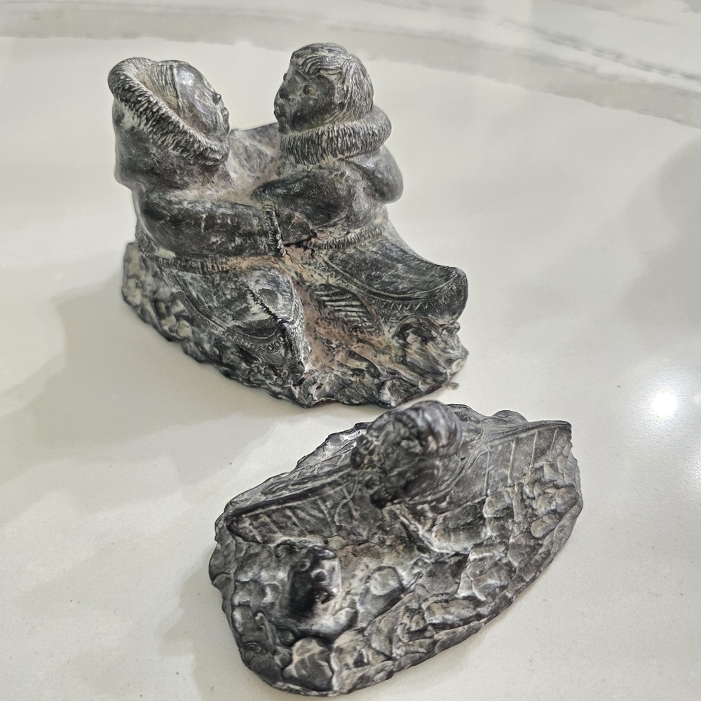 The Wolf Original Carved Stone Scultpures Of Inuit People In Boats